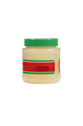 Side view of Tres Flores Brilliantine Pomade 3.25 oz. jar, displaying product label and ingredients.